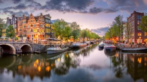 Historic Amsterdam canal at sunset