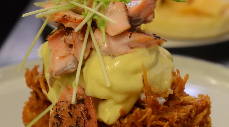 Poached egg with hollandaise, salmon and potato rosti photographed at Dignita in Amsterdam in 2015