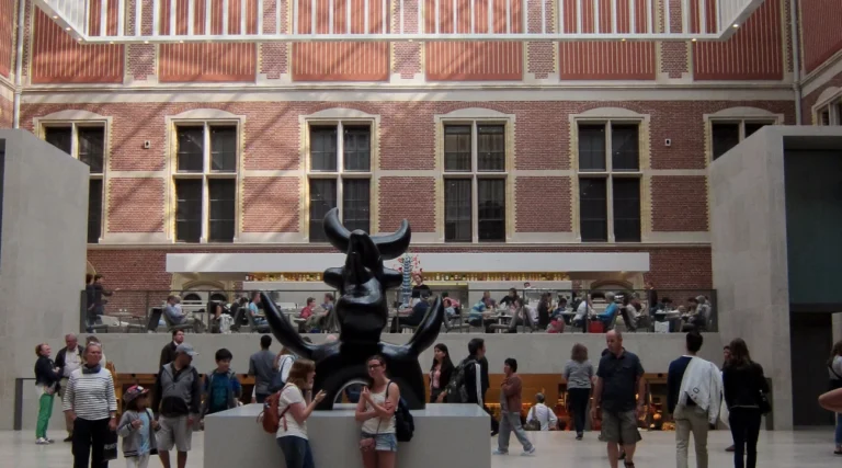 Rijksmuseum atrium with visitors and the raised caf&eacute; seating area, photographed in 2015