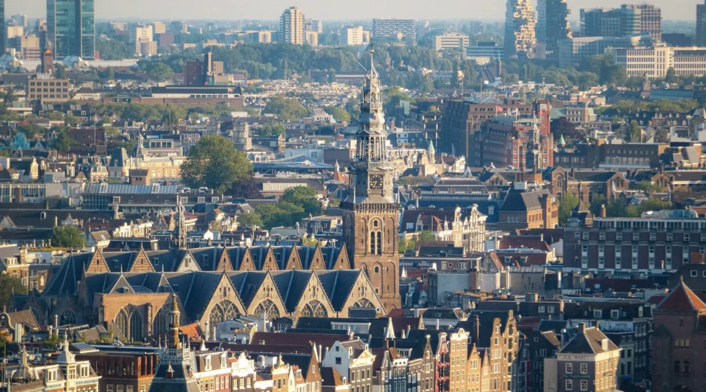Aerial view showcasing Amsterdam's historic architecture, highlighting a stunning skyline.