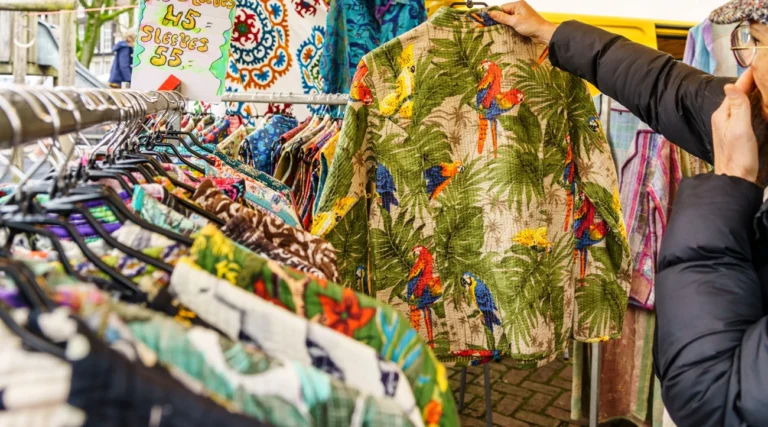Colourful vintage shirts displayed at a clothing stall at Noordermarkt in Amsterdam