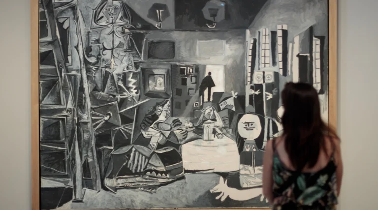 Woman watching a painting in Picasso Museum